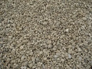 32 X Rollschotter ungewaschen Körnung: 32 – X mm Einsatzmöglichkeiten: Unter Bodenplatte, Hinterfüllung Arbeitsgraben